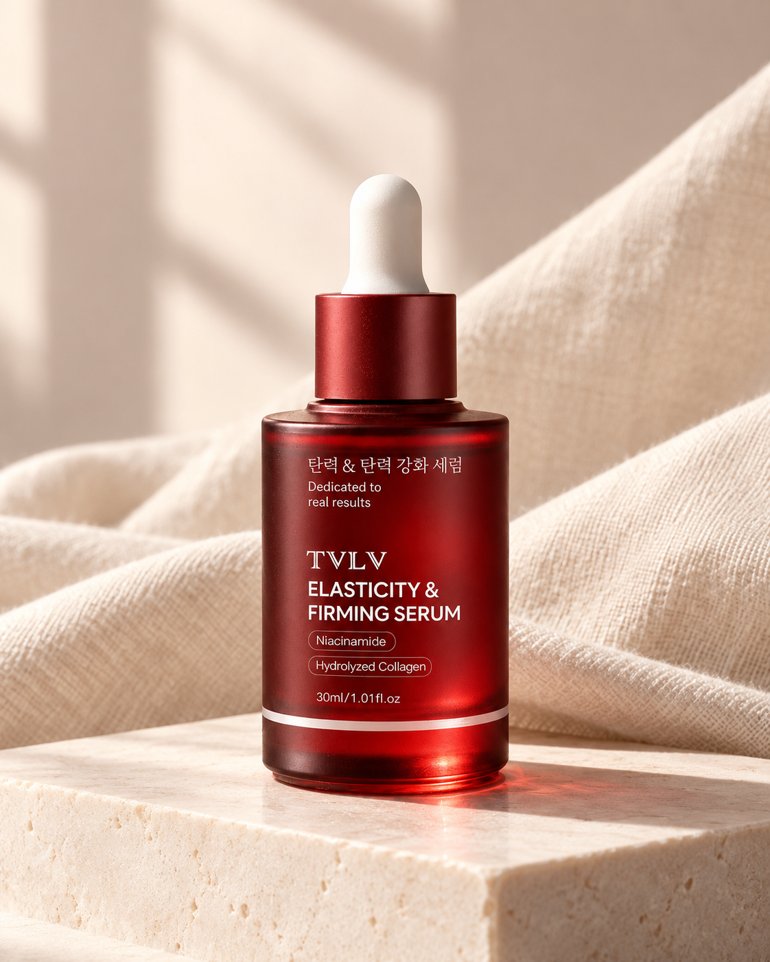 TVLV serum bottle on an ivory plinth with cream linen.